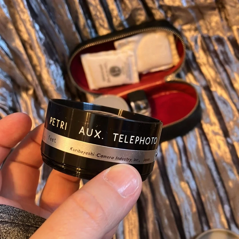 Petri 7 1.8 Camera 35mm, 2 additional Lens, & Popular fan flash reflector